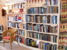 books in the extra bedroom